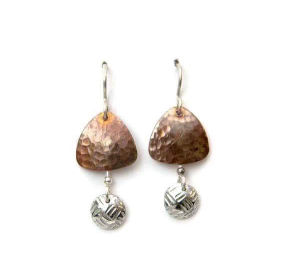 Copper earrings with pewter domes.